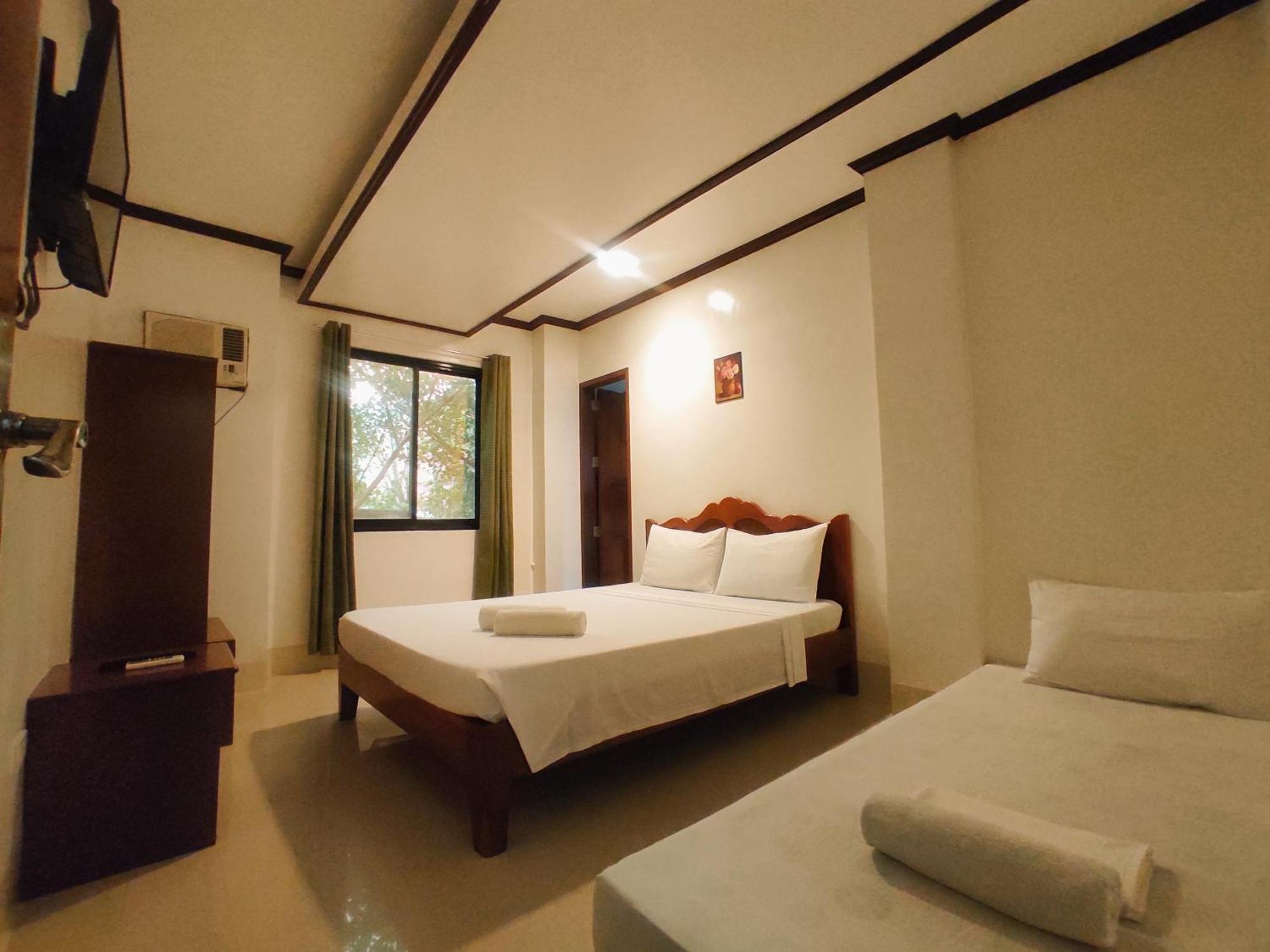 אל נידו Alocasia Hostel חדר תמונה